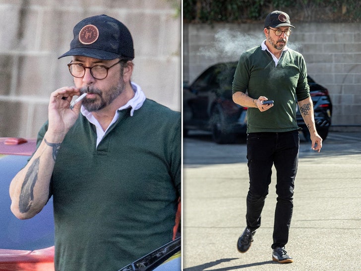 Dave Grohl Smokes Cigarette at Retailer After Child Mama’s Identification Comes Out