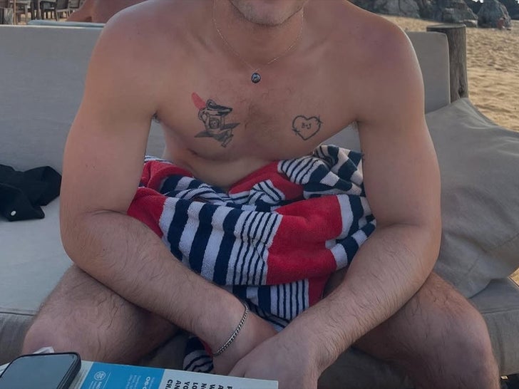 Can You Guess the Shirtless Stud With Tattoos?