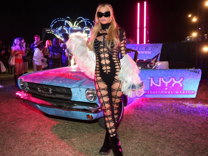 Paris Hilton Rocks Determine-Flashing Fishnet Catsuit at Coachella