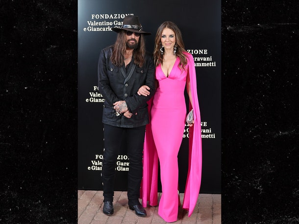 Billy Ray Cyrus, Liz Hurley Take Their Romance on the Highway to Rome