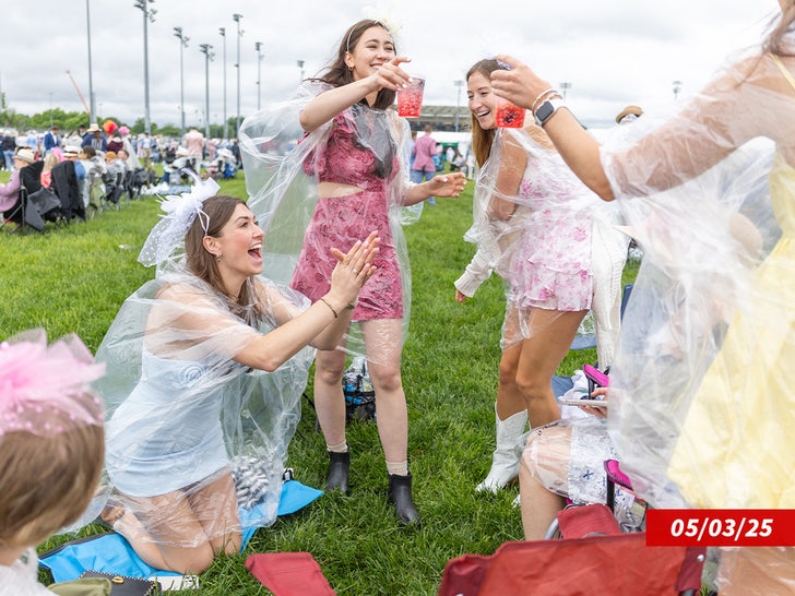 Kentucky Derby Attendees Courageous the Parts, Put on Rain Gear Over Outfits