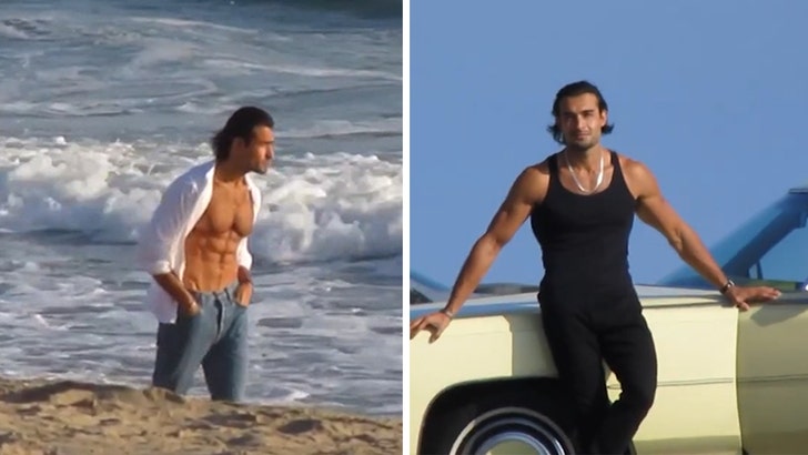 Sam Asghari Exhibits Off Rock-Laborious Abs in Steamy Malibu Seashore Picture Shoot