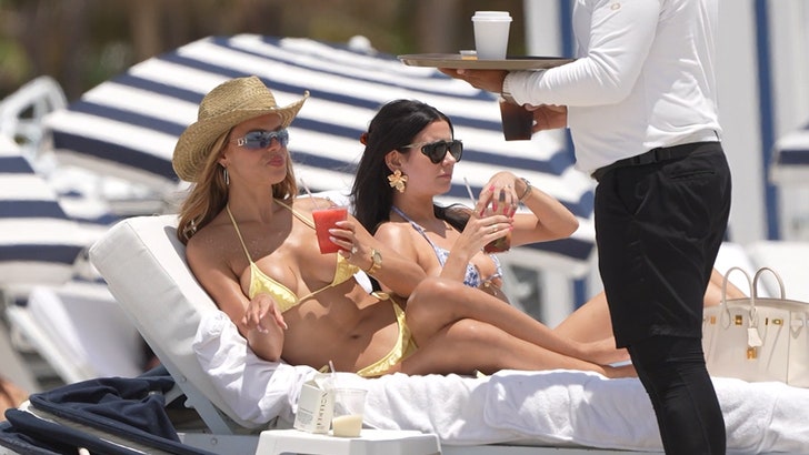 Brooks Nader Flaunts Banging Physique in Teeny Yellow Bikini on Seaside in Miami