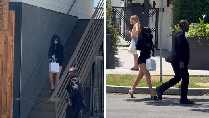 Bianca Censori Flaunts Lengthy Legs in Tiny Shorts, Drives Via L.A. With Kanye