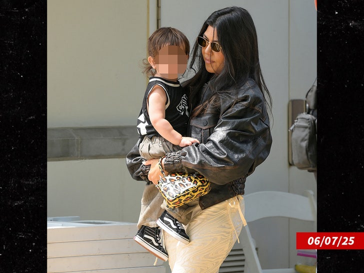 Kourtney Kardashian, Travis Barker Step Out with Child Rocky for Uncommon Public Look