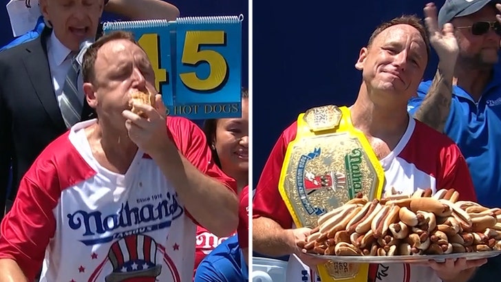 Joey Chestnut Wins In Scorching Canine Contest Return, Downs 70.5 Wieners on Fourth of July